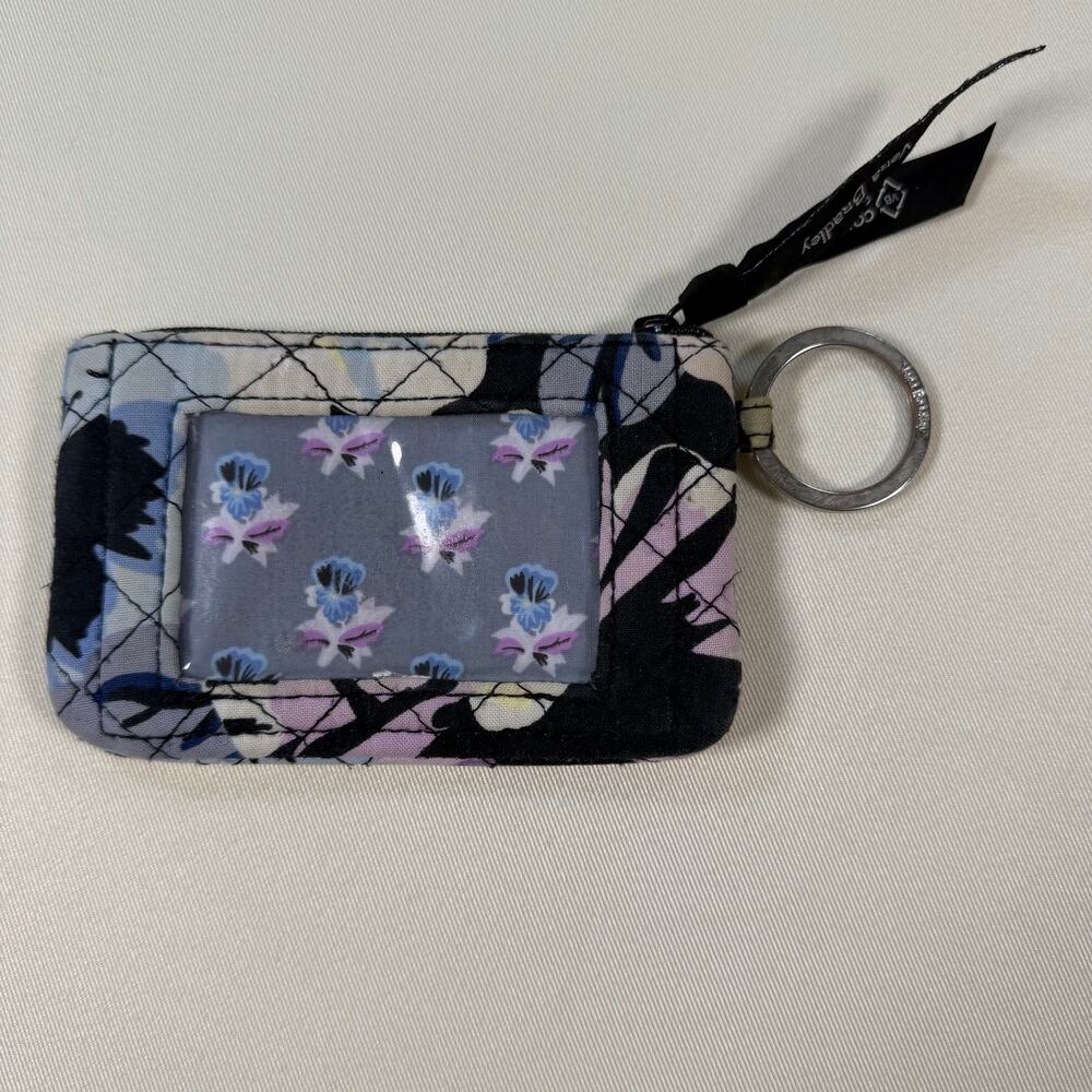 Vera Bradley Zip ID Case in the Plum Pansies floral pattern excellent condition